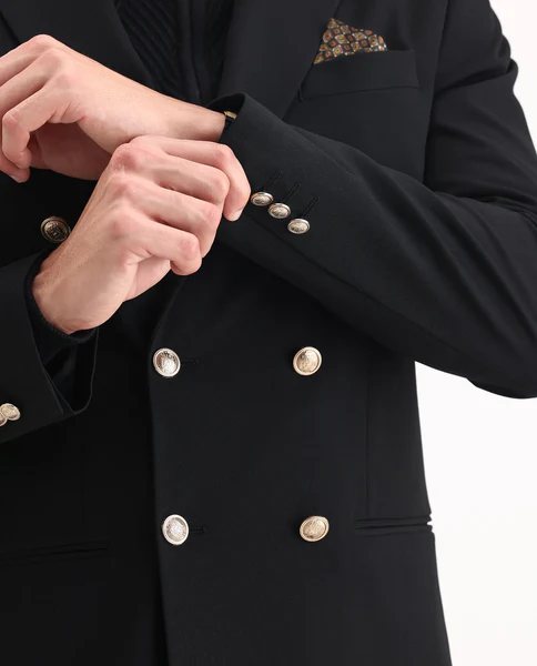 Gold-button blazer detail tailored by Decent Tailor Ahmedabad